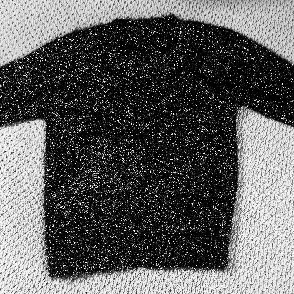 Elegant sweater with metallic threads